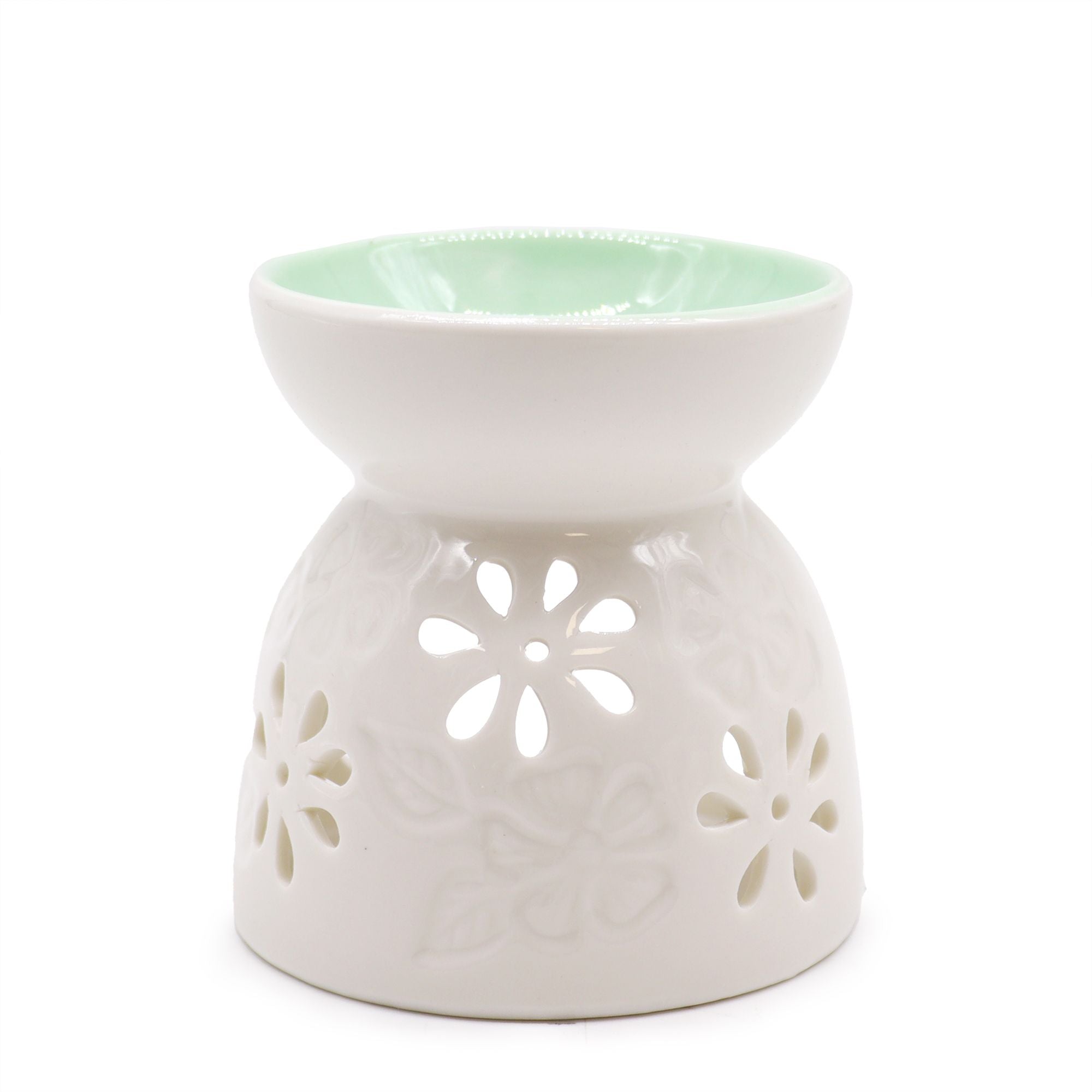 brûleur à huile en céramique blanche avec motifs floraux pour diffusion de parfum et ambiance relaxante