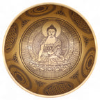 Intérieur d’un bol chantant tibétain bouddha avec gravure détaillée de Bouddha et symboles spirituels