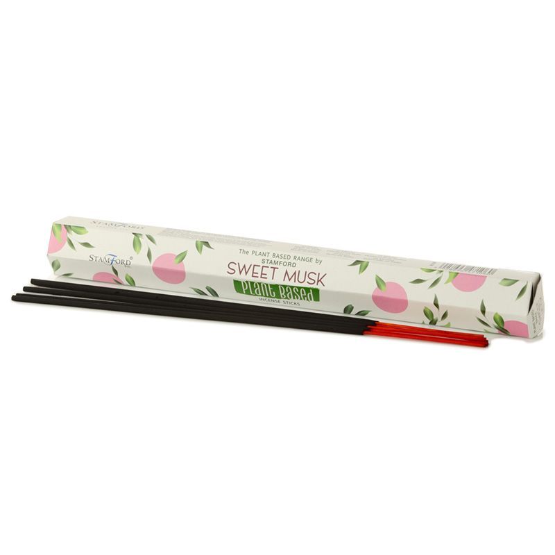 Boite de batonnets d encens naturels Stamford musc avec support a encens et batonnets rouges dans une ambiance minimaliste et naturelle