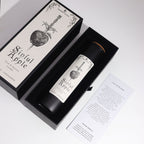 Bougie rituelle Sinful Apple dans son coffret ouvert avec carte de rituel incluse