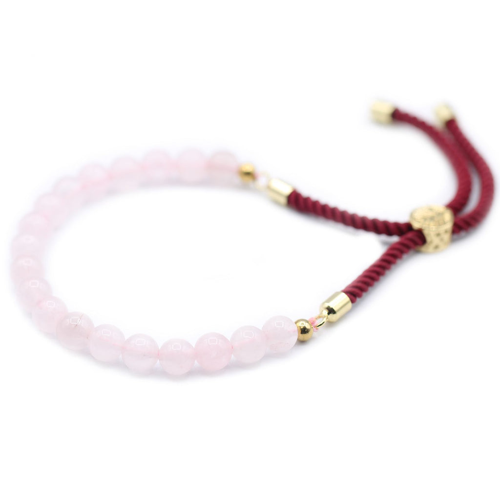Bracelet en pierre naturelle qurtz rose ajustable avec cordon rouge et perles rose