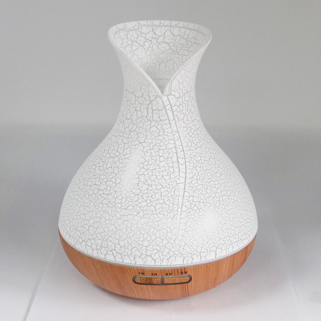 Diffuseur Palma effet coquillage avec design élégant et lumière LED