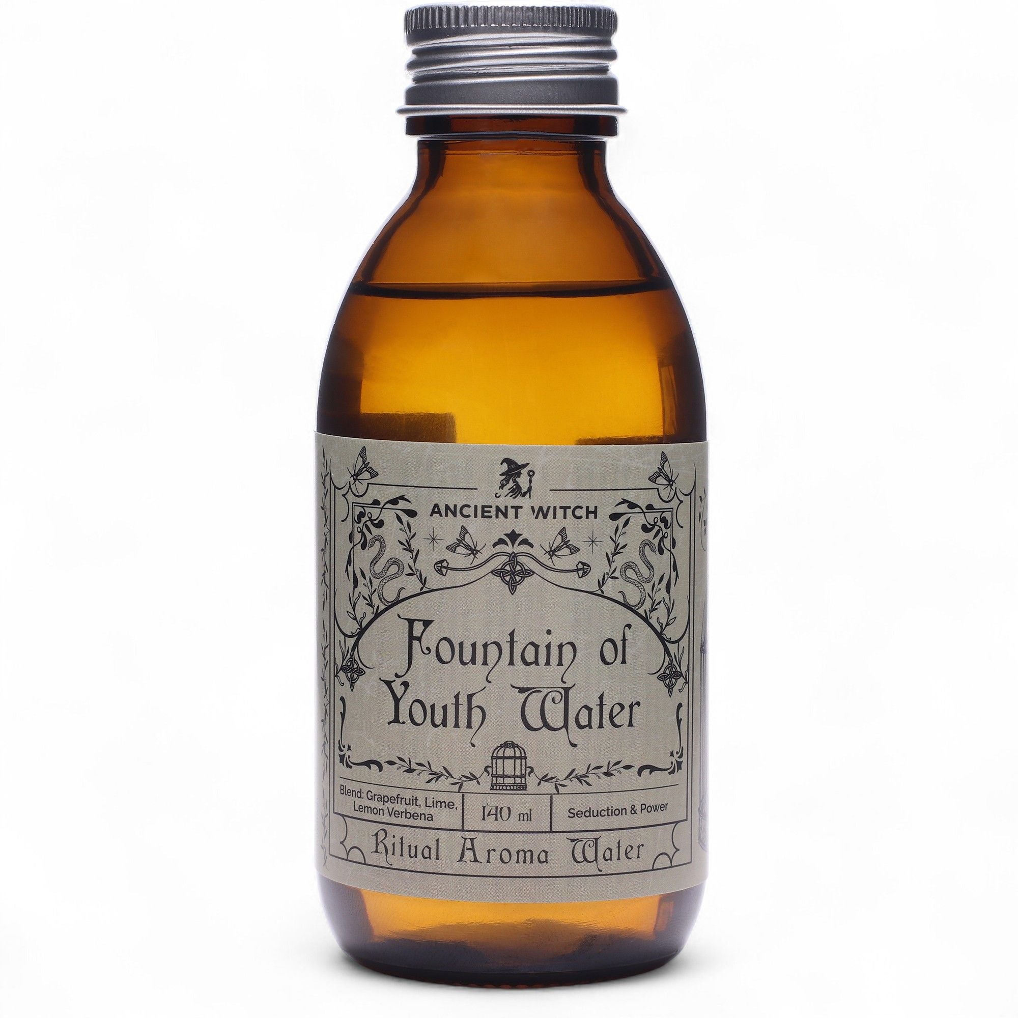 Flacon en verre ambré de l’eau rituelle Fontaine de jouvence avec étiquette vintage, inspirée des rituels de purification et de vitalité