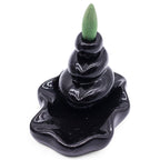 brûleur d’encens backflow aromatika avec cône jasmin créant une cascade de fumée relaxante
