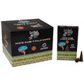 Boite d encens backflow Tribal Soul Sauge blanche et Palo Santo avec cones d encens naturels presents a cote du packaging noir et motifs ethniques