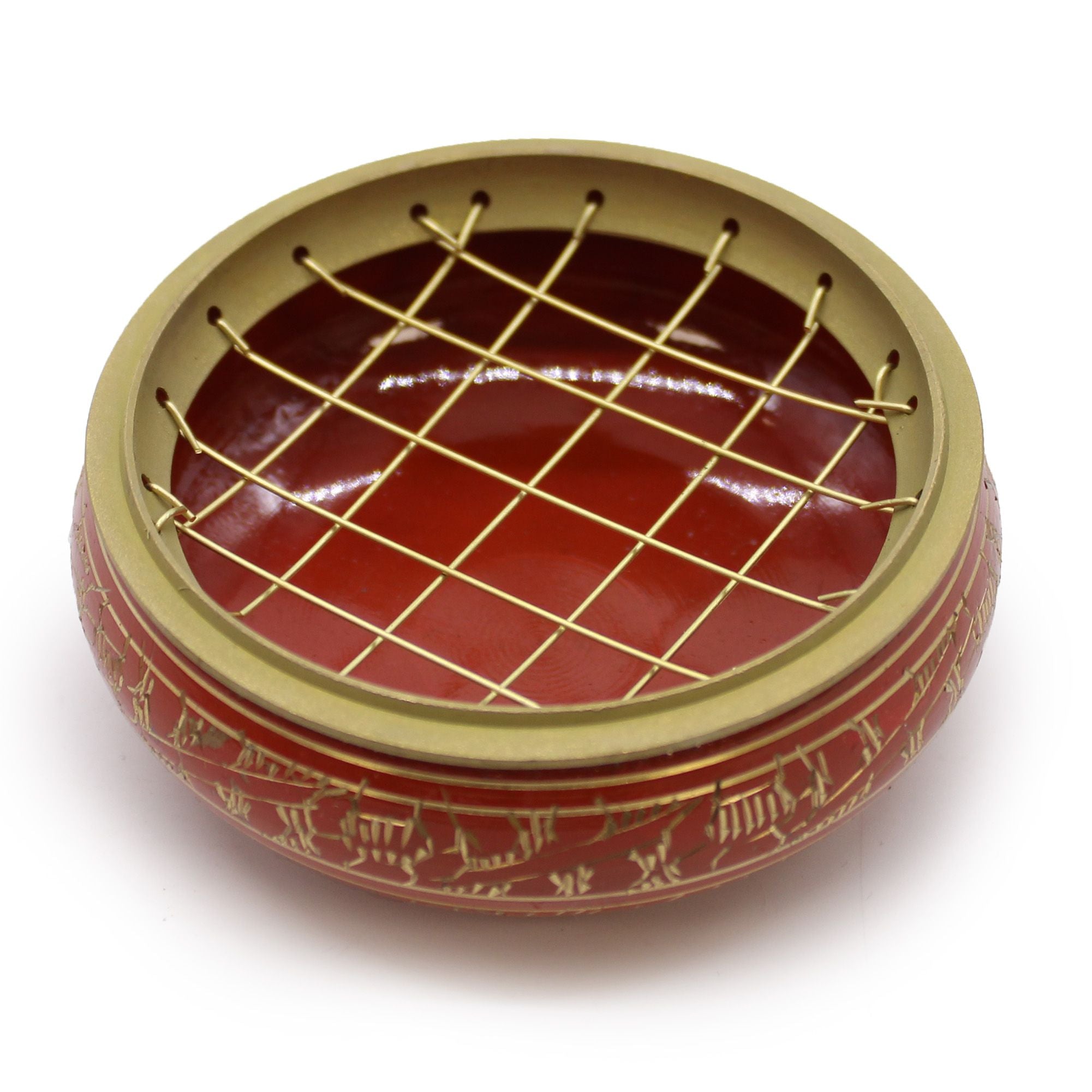 Détail du brûleur d’encens orange en laiton avec grille or pour charbon, chakra sacré, vue du dessus