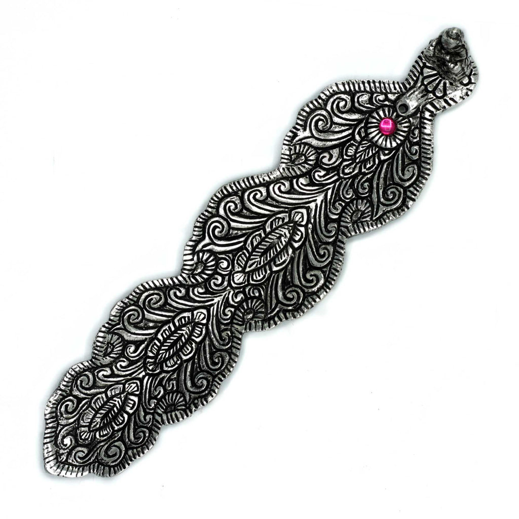 Porte-encens Bouddha long 20 cm en métal, vue de dessus avec motifs gravés, idéal pour rituel de méditation et décoration zen.